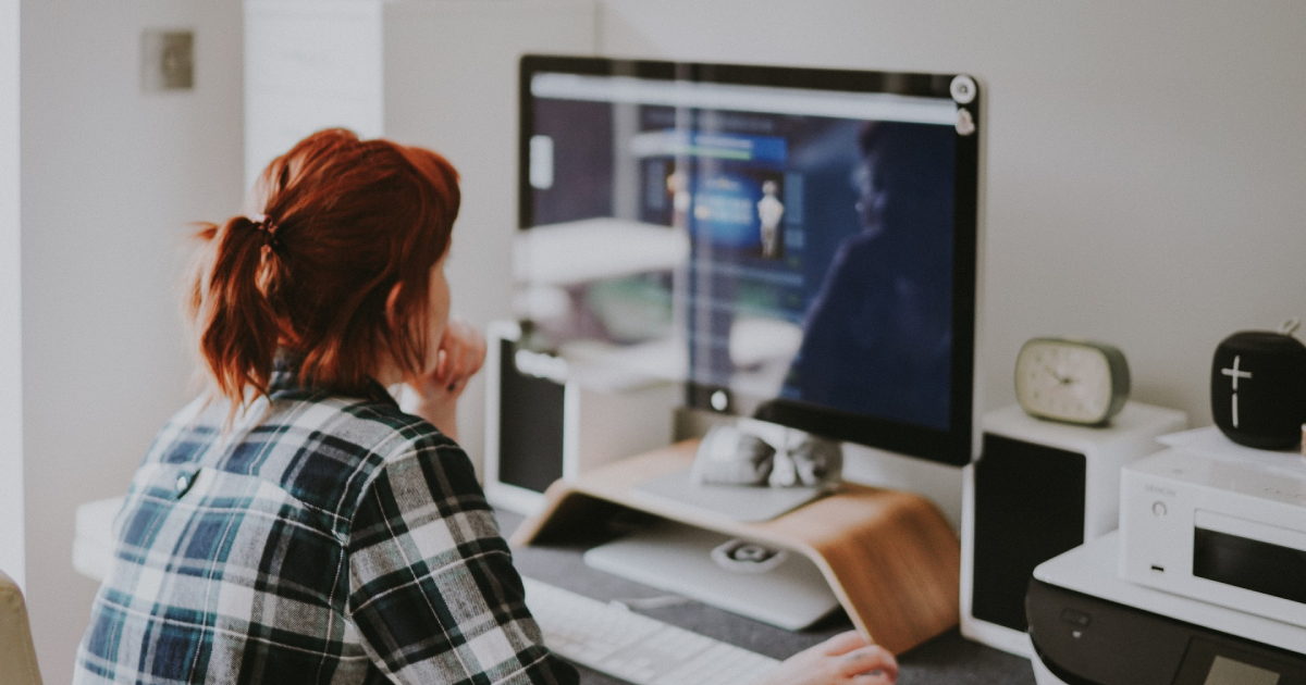 Woman looking at computer screen