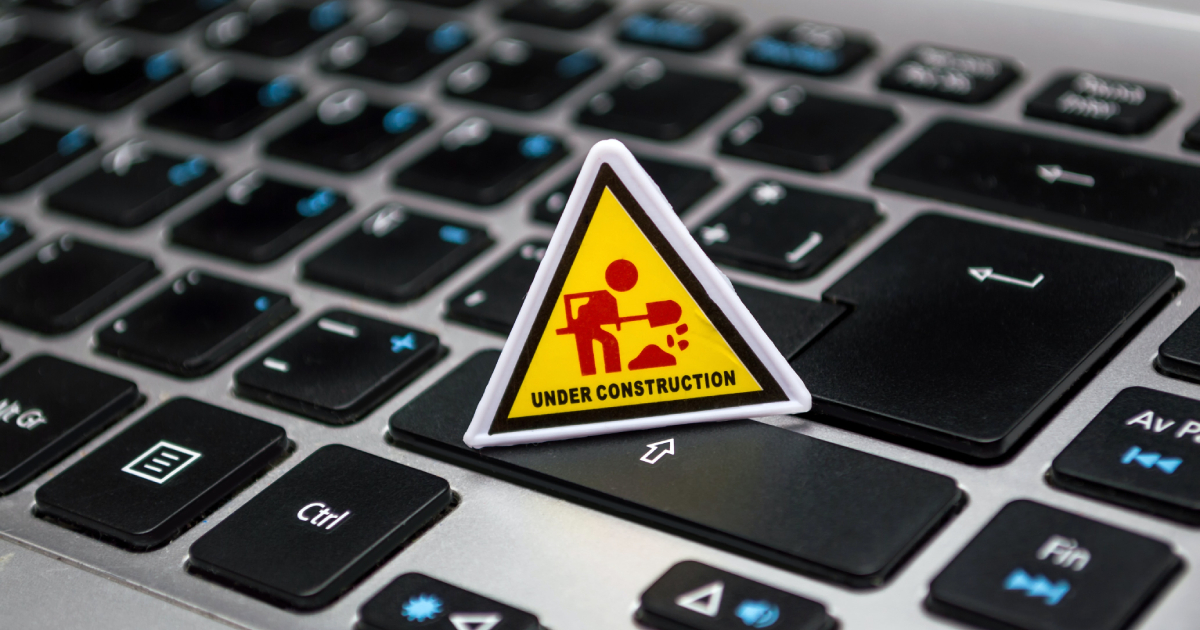 Under construction sign on keyboard